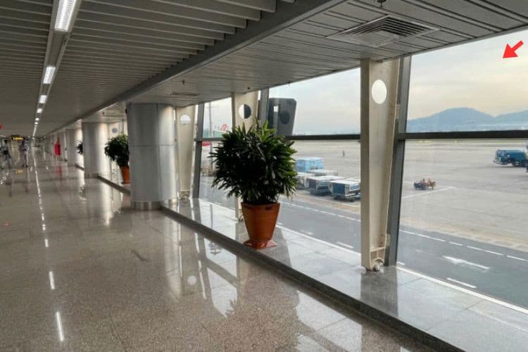 Horizontal Indoor Overhead Signage Billboard at Da Nang International Airport, Hoa Cuong Ward, Da Nang City (Decal affixed on the glass wall at Level 2, walkway leading passengers from the aircraft to the Domestic Arrivals Terminal)