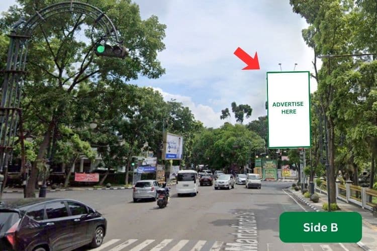 Vertical Static Billboard at Jl LLRE Martadinata (Jalan Riau), Bandung, Jawa Barat  (near Sister City Park)- Day View - Side B