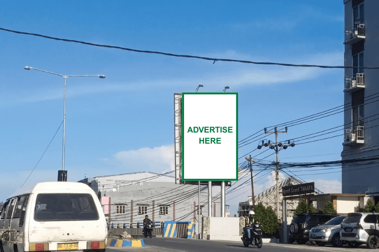Vertical Baliho Billboard at Jl. Raya Kemiri, Sentani, Jayapura, Papua nearby Grand Tahara Sentani (Day View)